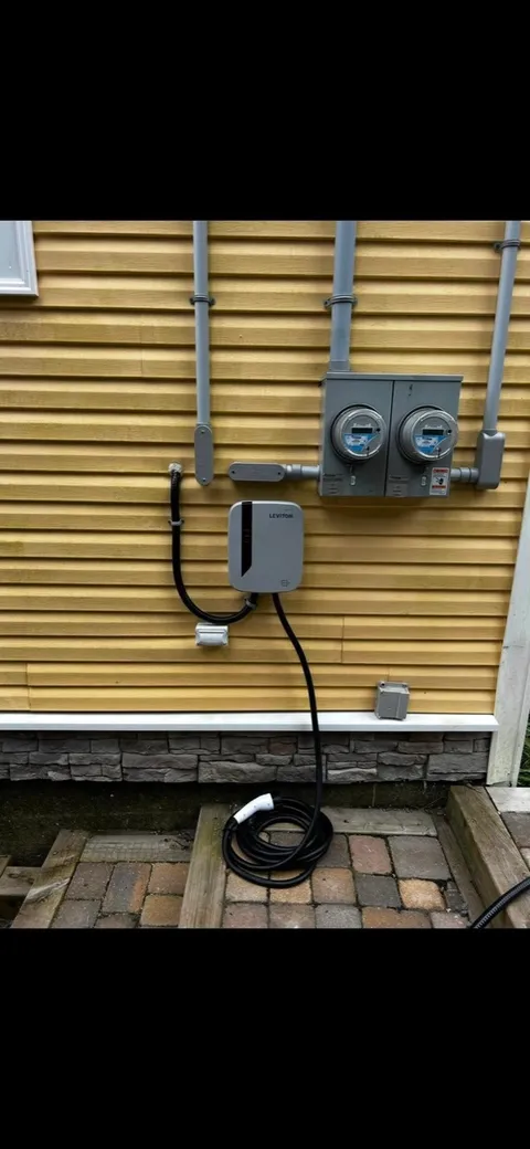 Two new meter bases and a disconnect on a two-unit conversion